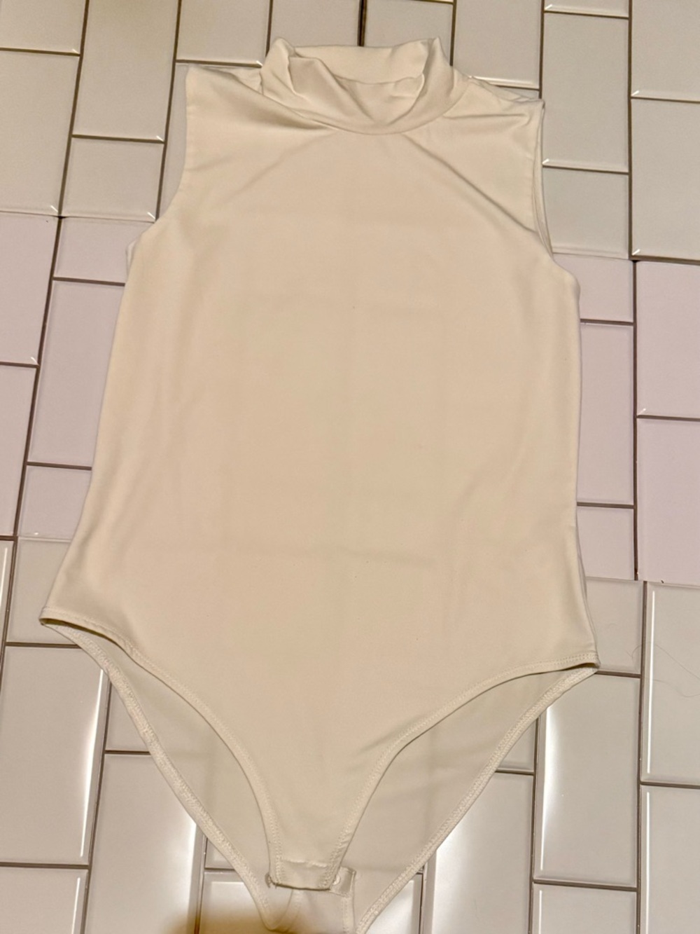 Sleeveless Mock Neck Bodysuit in Crisp White